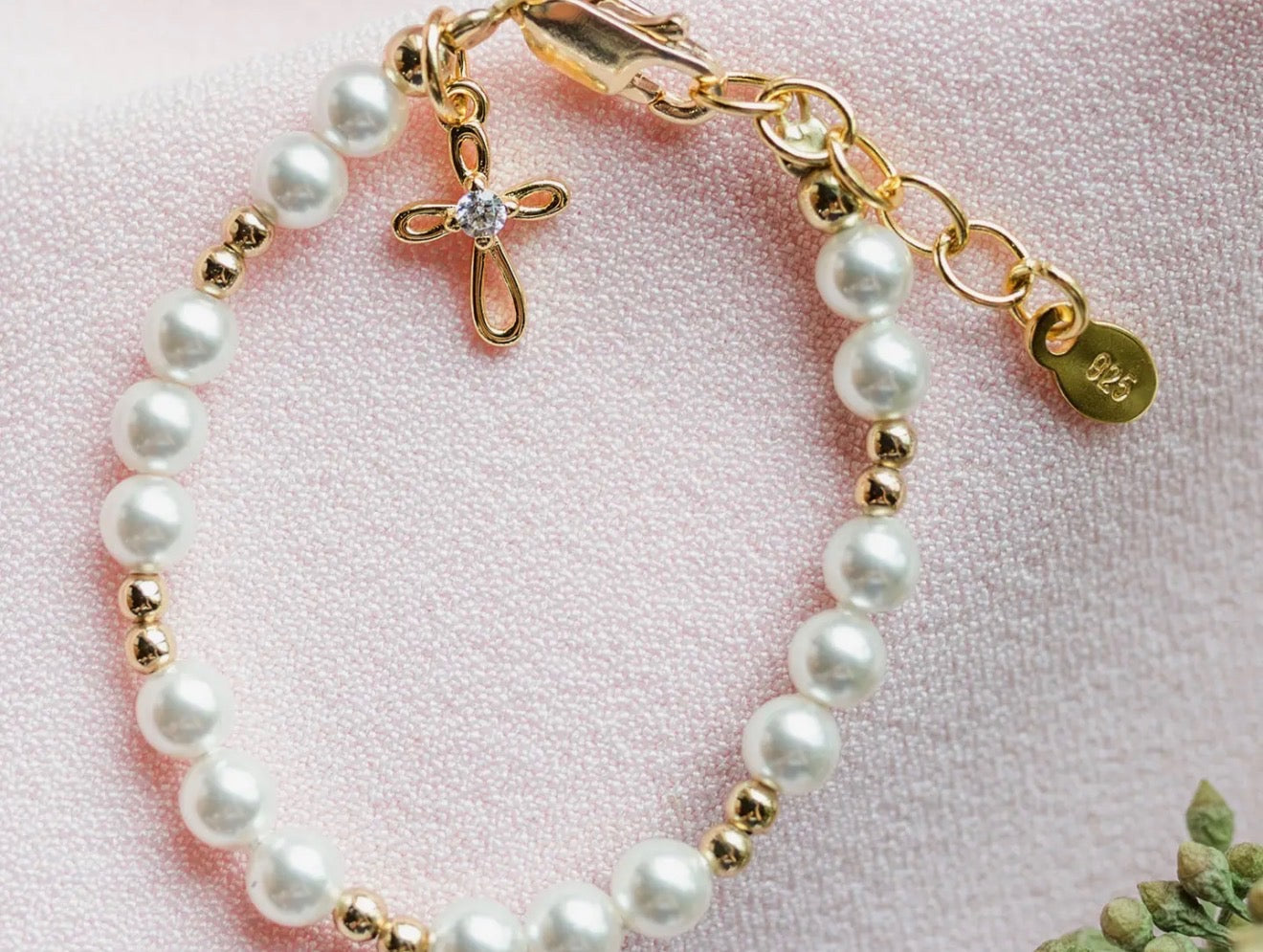 Pearl and gold with cross