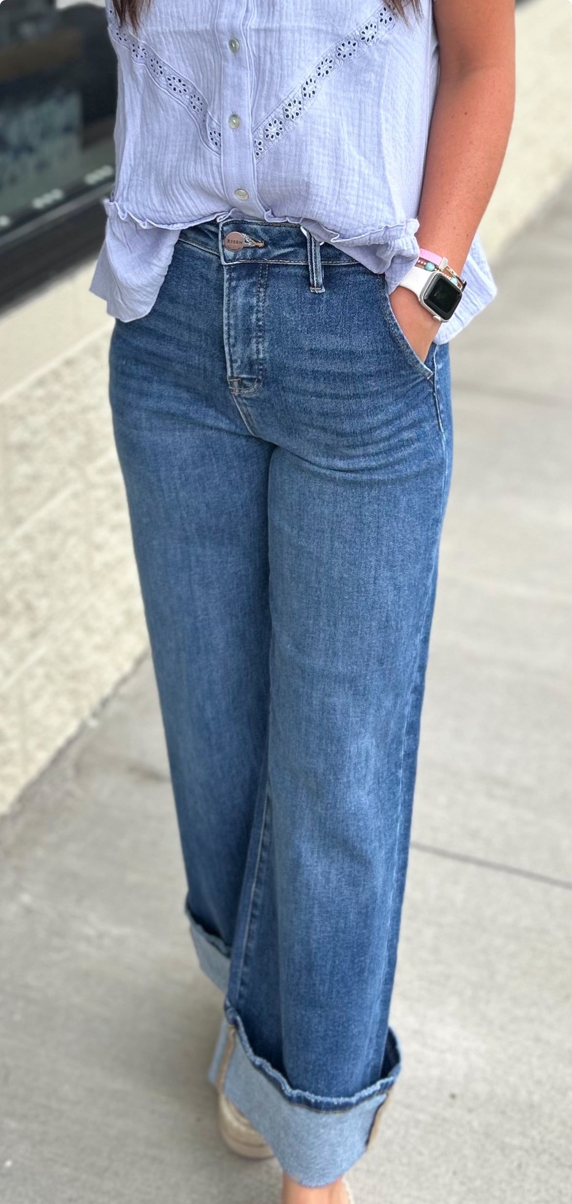 Blue denim rolled jeans
